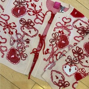Queen of sparkles heart lock and key  light pink tie cardigan